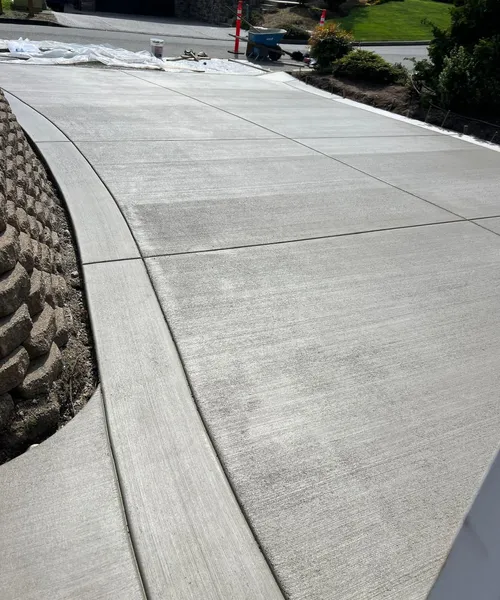 Broom Finish Driveway With Decorative Borders in Edmonds 